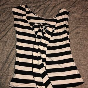 Scoop low open back striped top with bow.